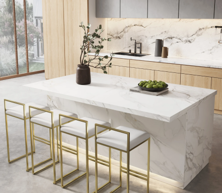 Modern kitchen with a marble island, gold bar stools, and minimalist decor.